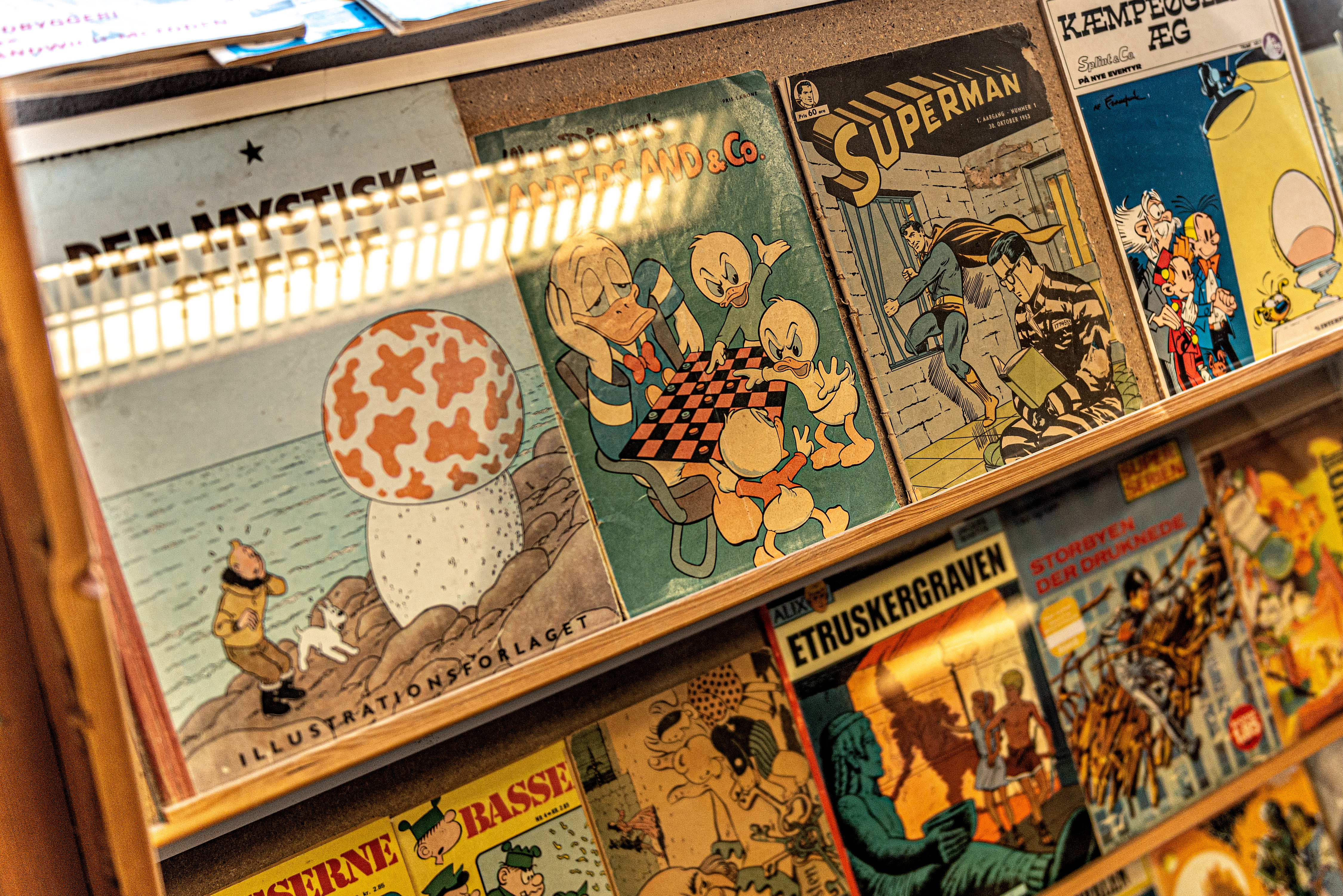 Tegneserier i Den Gamle By K i antikvarboghandler i Den Gamle By