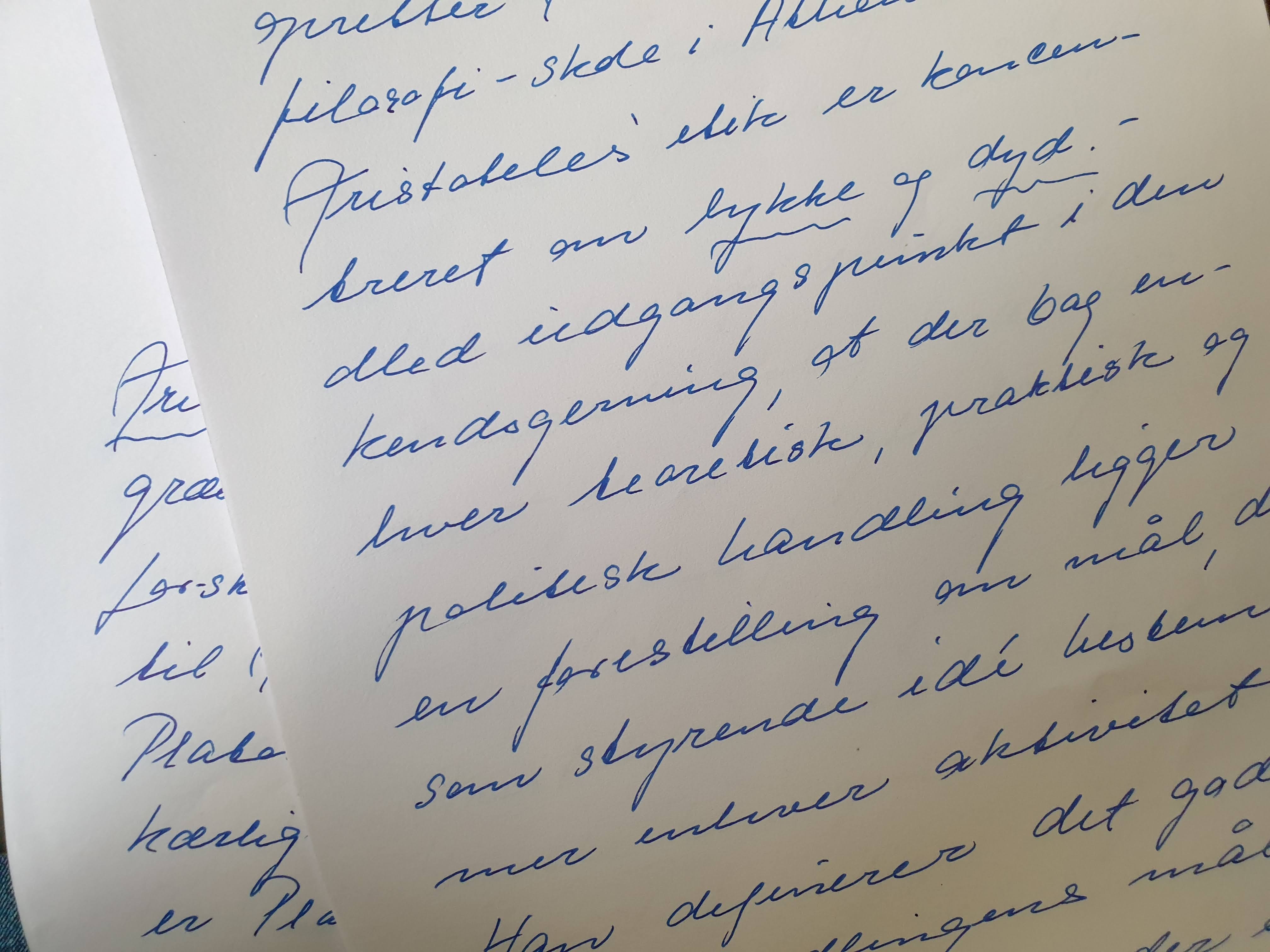 Bagsiden: Opgave skrevet i hånden